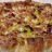 Pizza di sfoglia con patate provola e prosciutto